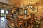 Living room view of dining areawith seating for 8
